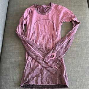 Lululemon long sleeve swiftly shirt. Purple barley worn, size 2